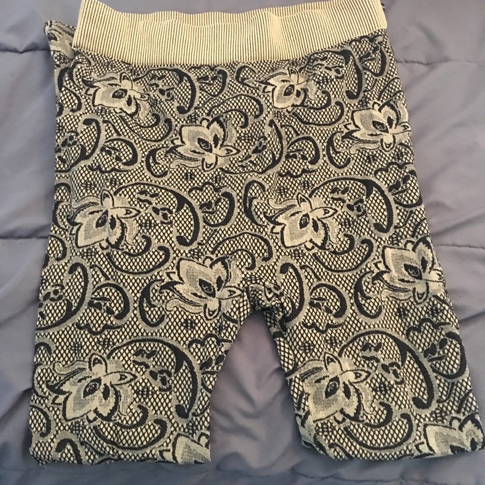 Tan leggings with black lace design